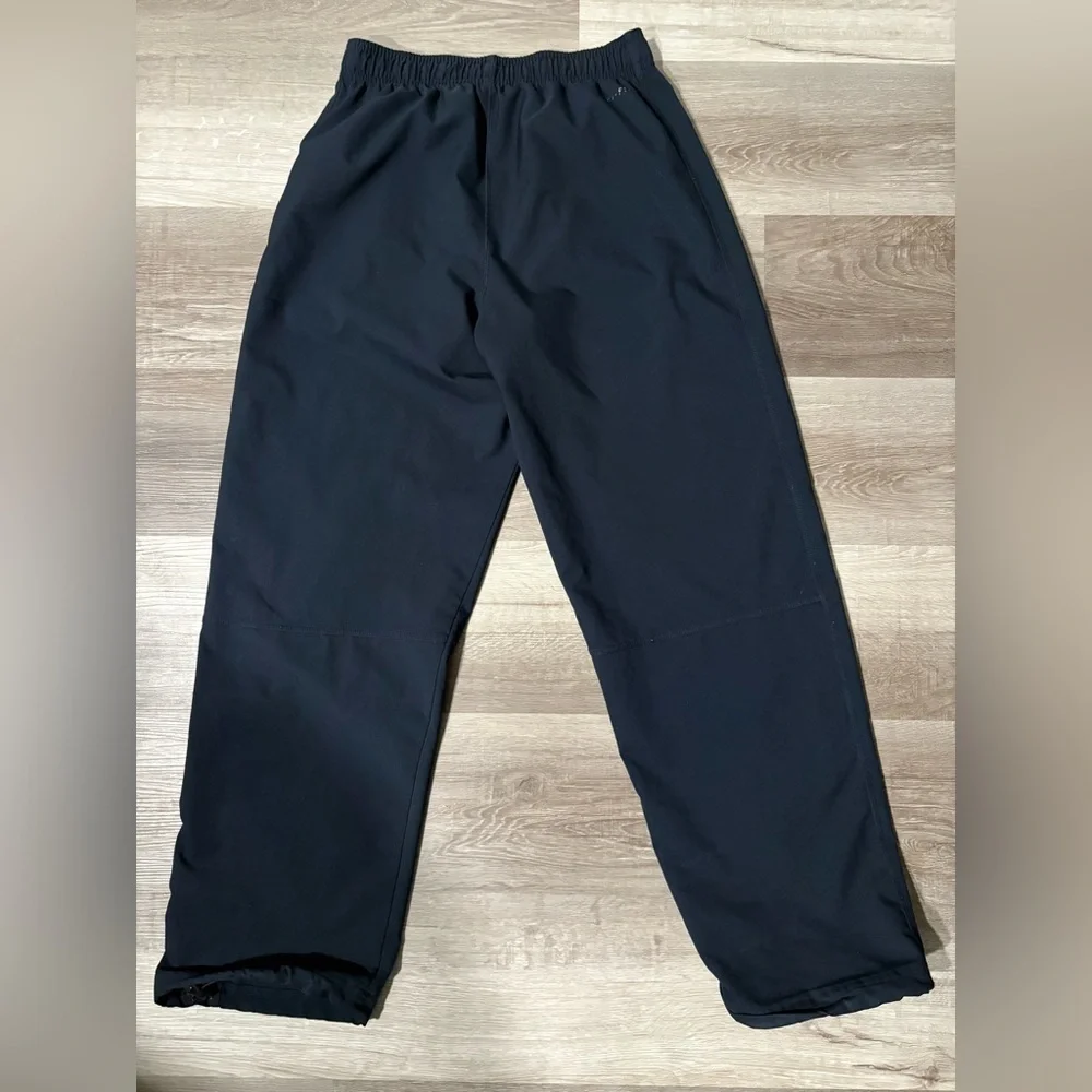 Nike Dri-FIT Performance track pants with Silver Logo